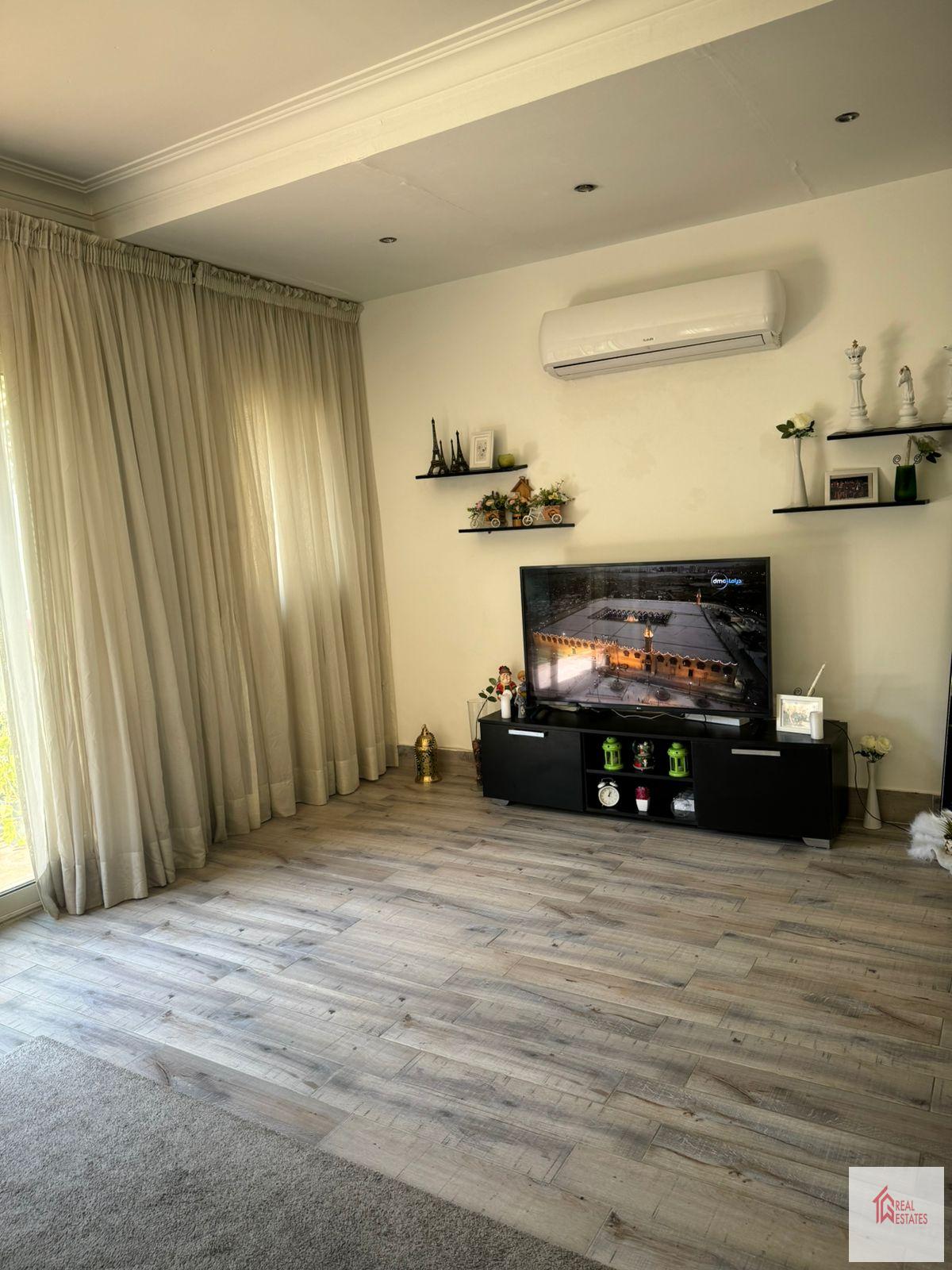 The modern apartment on the ground floor in House in Katameya Heights Extension contains 3 bedrooms, 3 bathrooms, a large living room open to the kitchen fully furnished garden. I have an apartment rent Katameya Heights