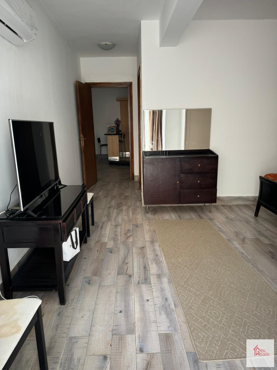 The modern apartment on the ground floor in House in Katameya Heights Extension contains 3 bedrooms, 3 bathrooms, a large living room open to the kitchen fully furnished garden. I have an apartment  rent Katameya Heights