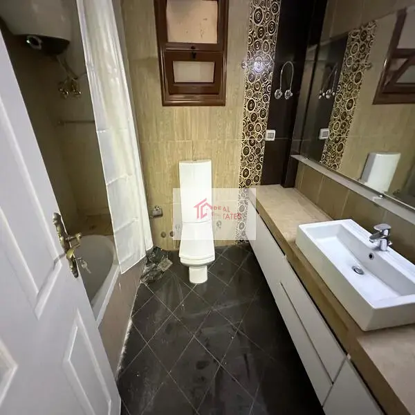 Apartment for rent in Maadi Sarayat, 3 bedrooms, 3 bathrooms, 1 master living room, maid's room, 2,000 DOLLERS