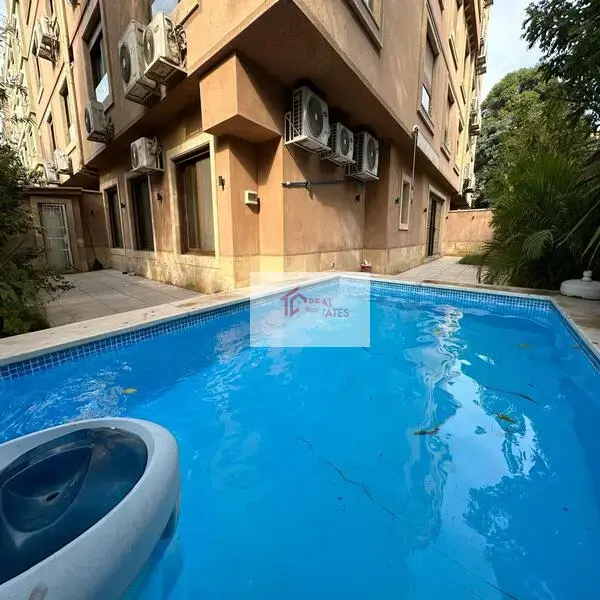 Stunning modern duplex apartment for rent in Sarayat El Maadi, Cairo, Egypt. Semi-furnished, with a private pool and garden.
